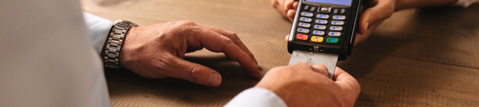 a customer using a card reader