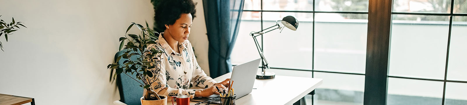 a woman at her at-home desk